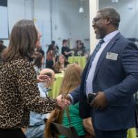 Dean Ogundipe shaking hands